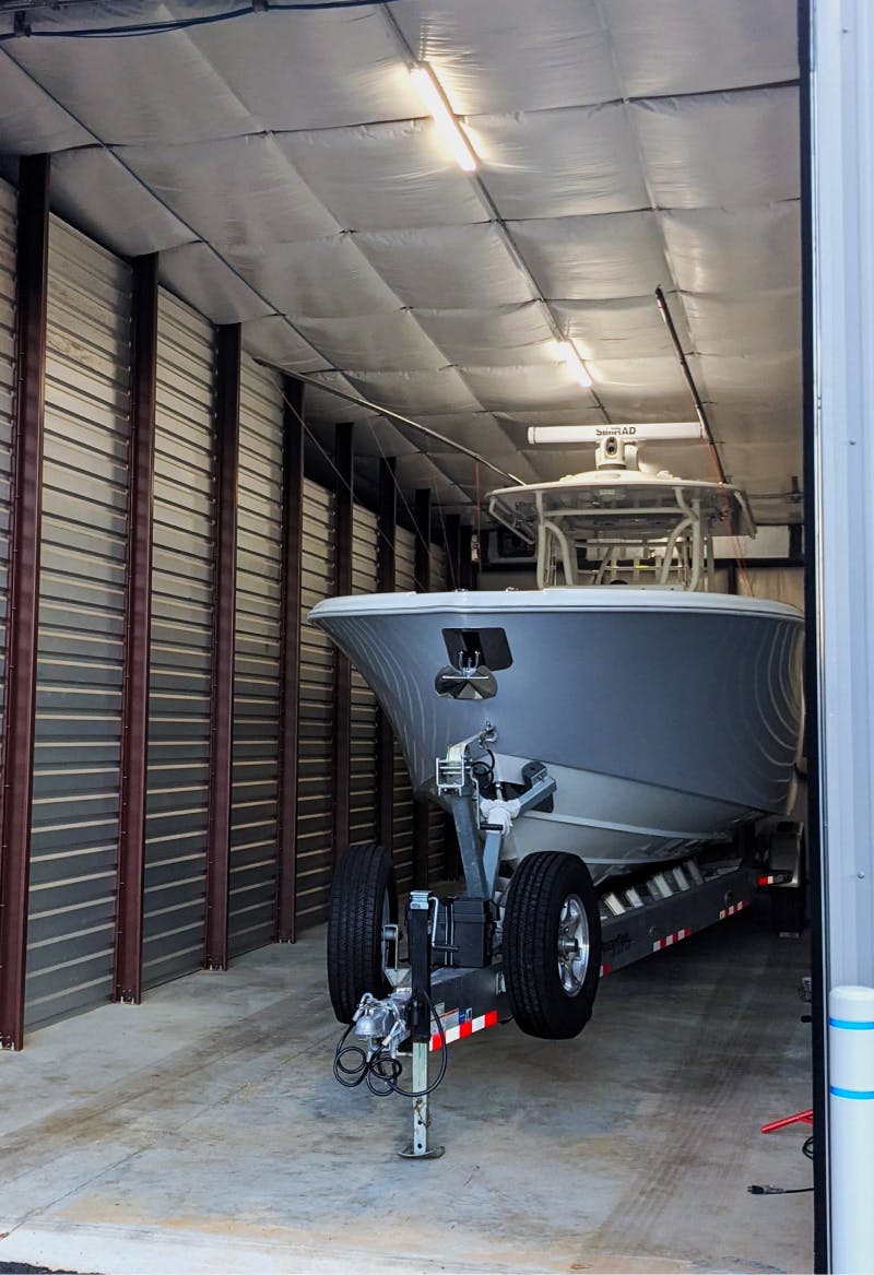 36-foot Center Console Boat on Trailer inside an enclosed climate-controlled 15 foot by 50 foot storage unit