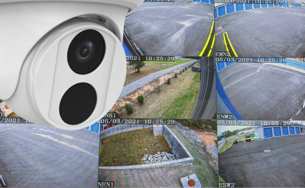 Screen capture of security camera images on monitor displaying views of facility with example of 4k HD cameras used