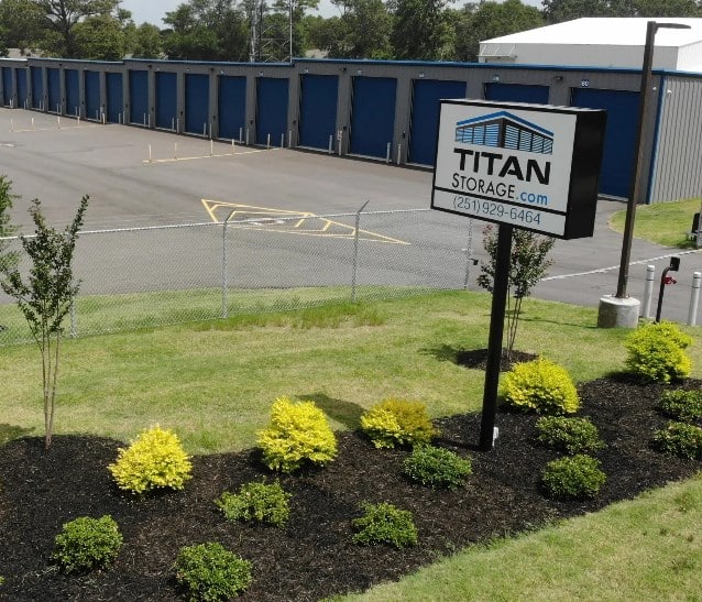 titan storage entrance sign buildings fence